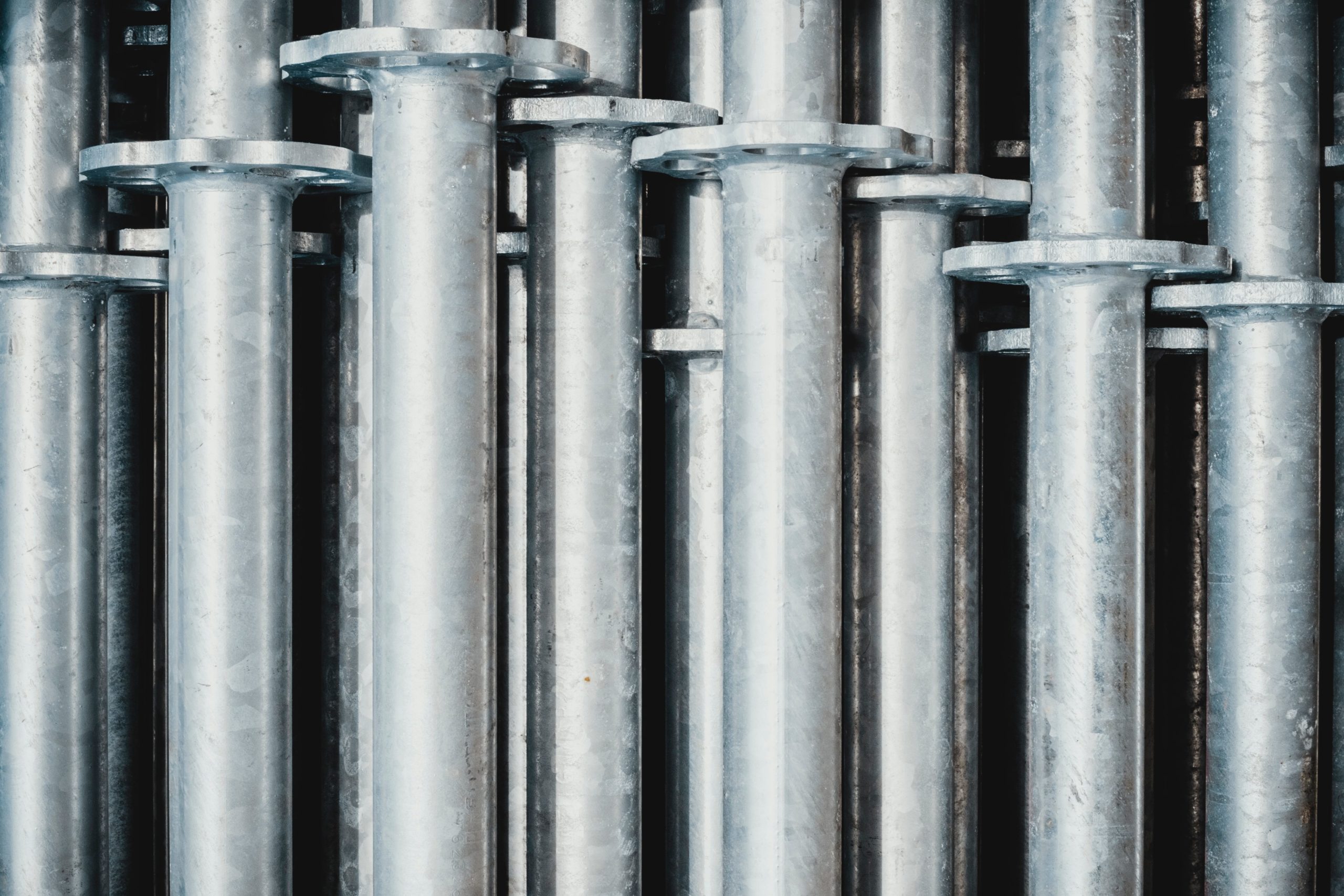 A row of pipes made of recycled metal.
